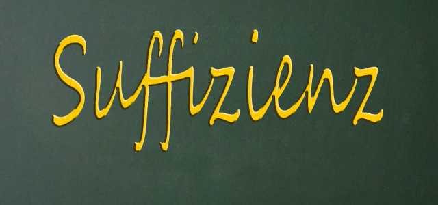 Schild mit der Aufschrift Suffizienz